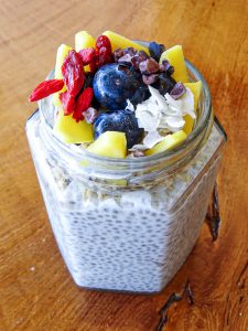 chia pudding topped with tropical fruit